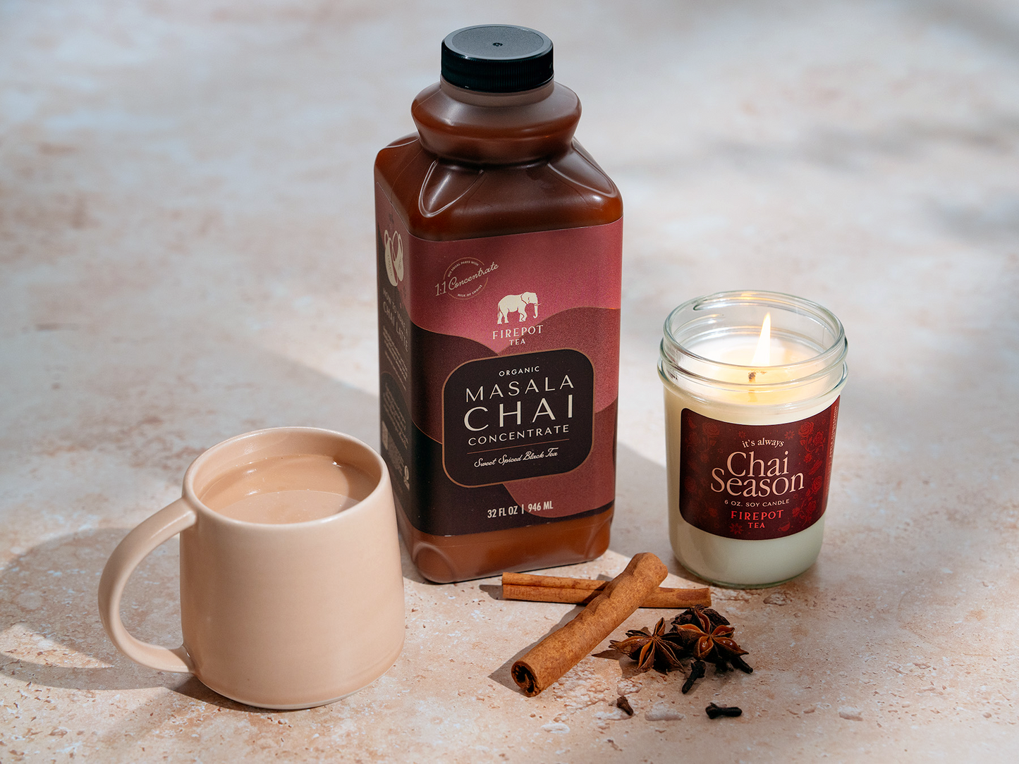 image of 6oz soy chai scented candle with bottle of 32oz masala chai concentrate and chai latte