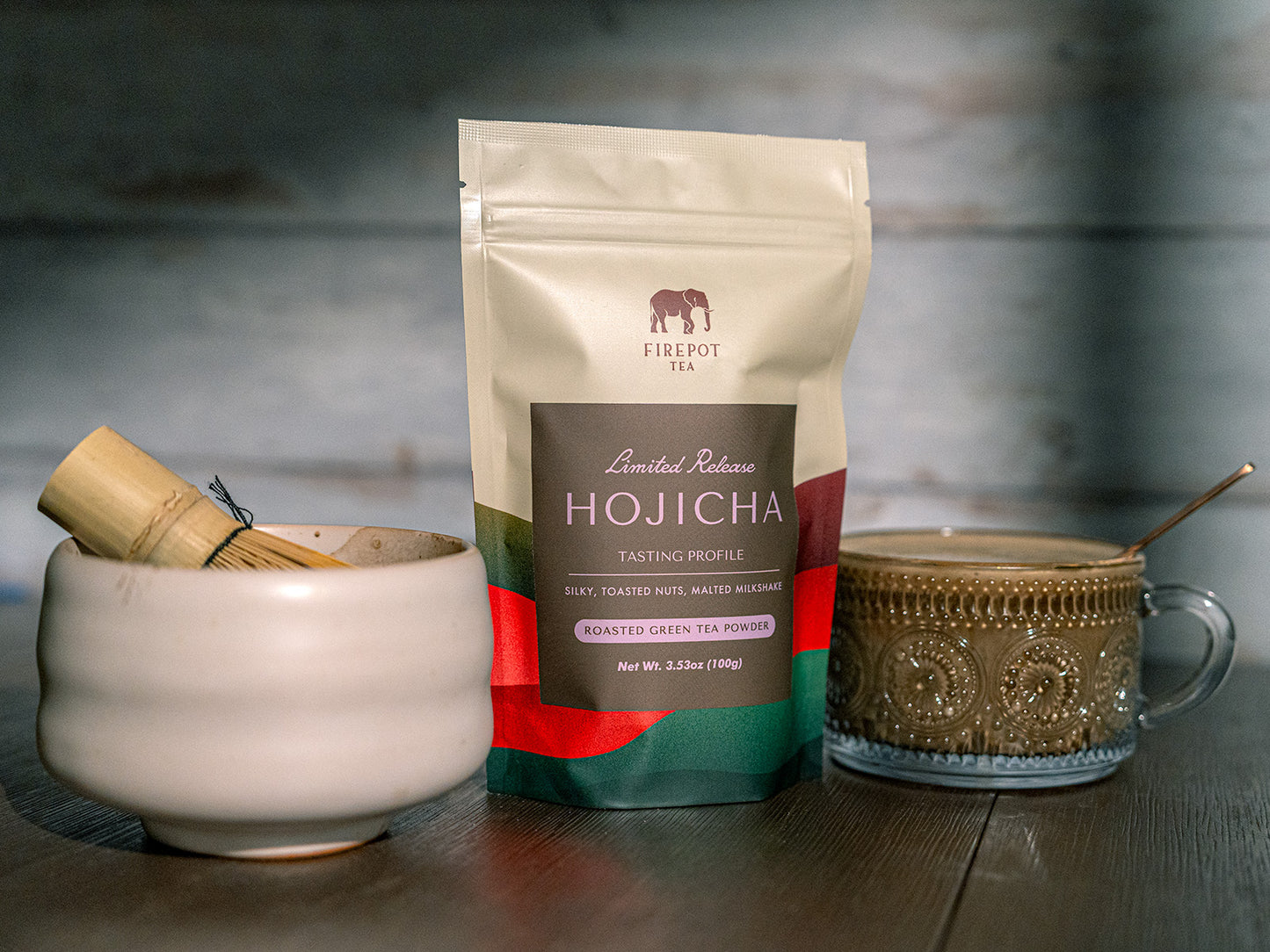 image of bag of hojicha, whisk and mug